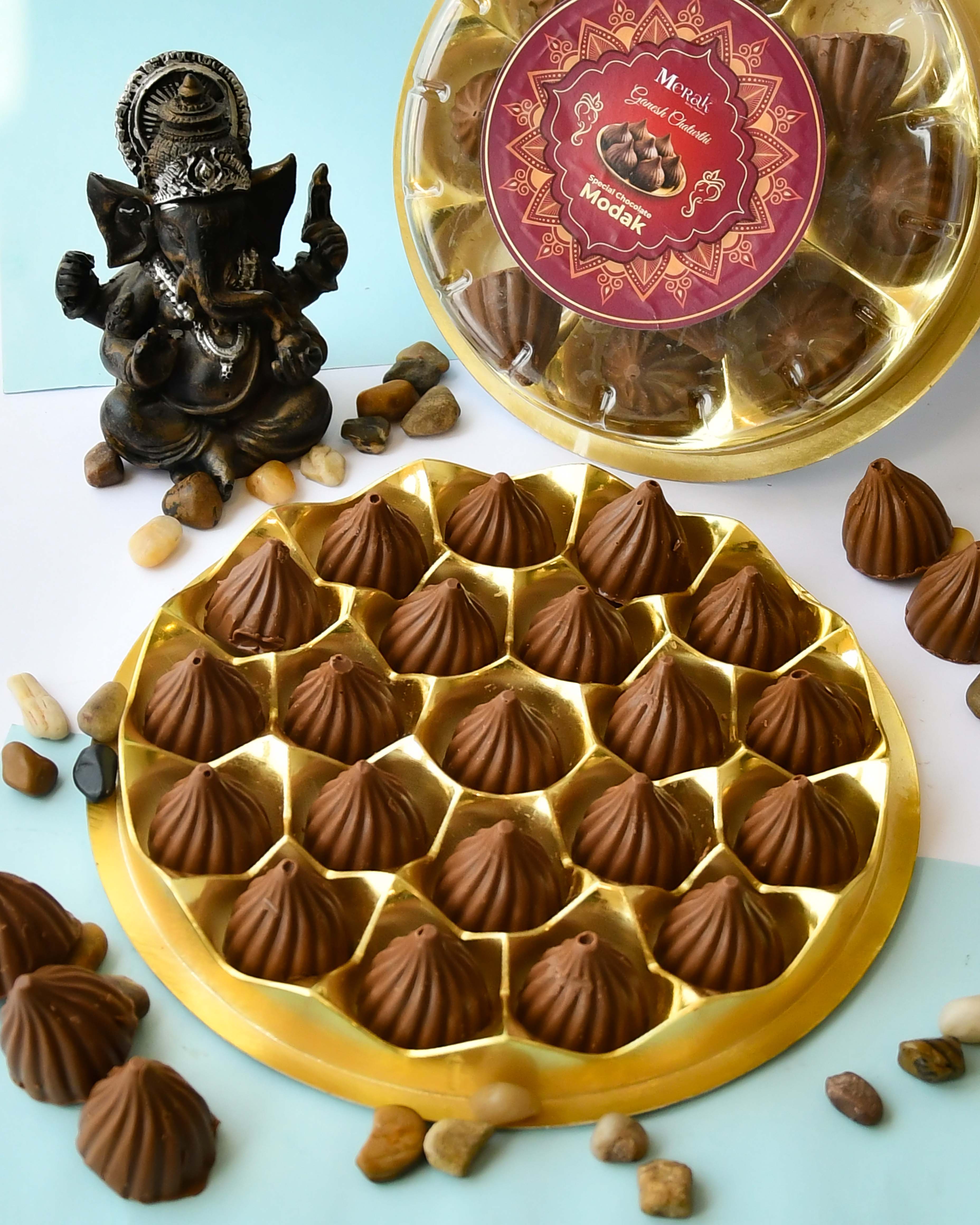 https://merakcakes.com/cdn/shop/files/21PCCHOCOLATEMODAK.jpg?v=1694516192