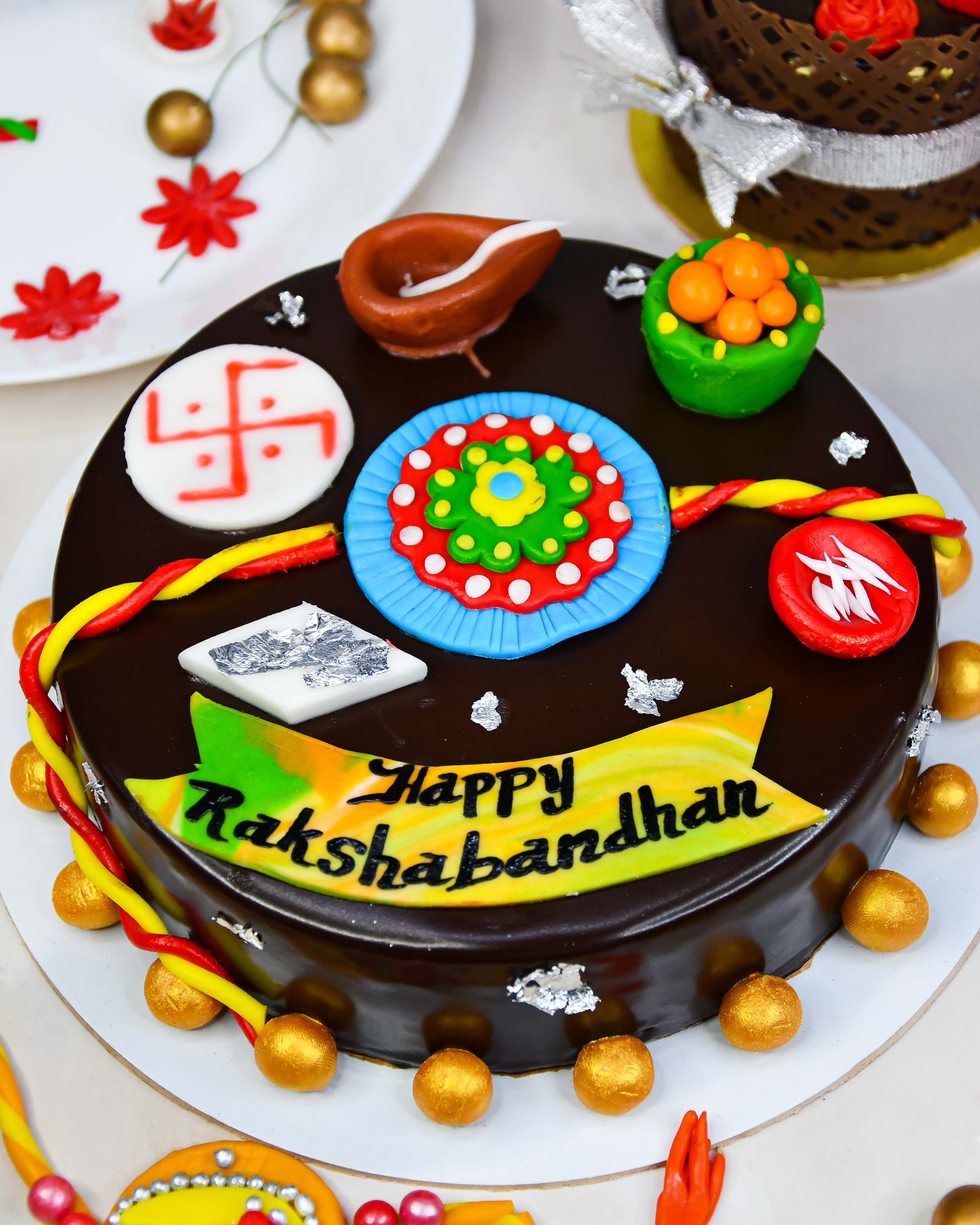 Om Rakhi cake With Chocolate| Raksha Bandhan Special Cakes Online in Dwarka  |