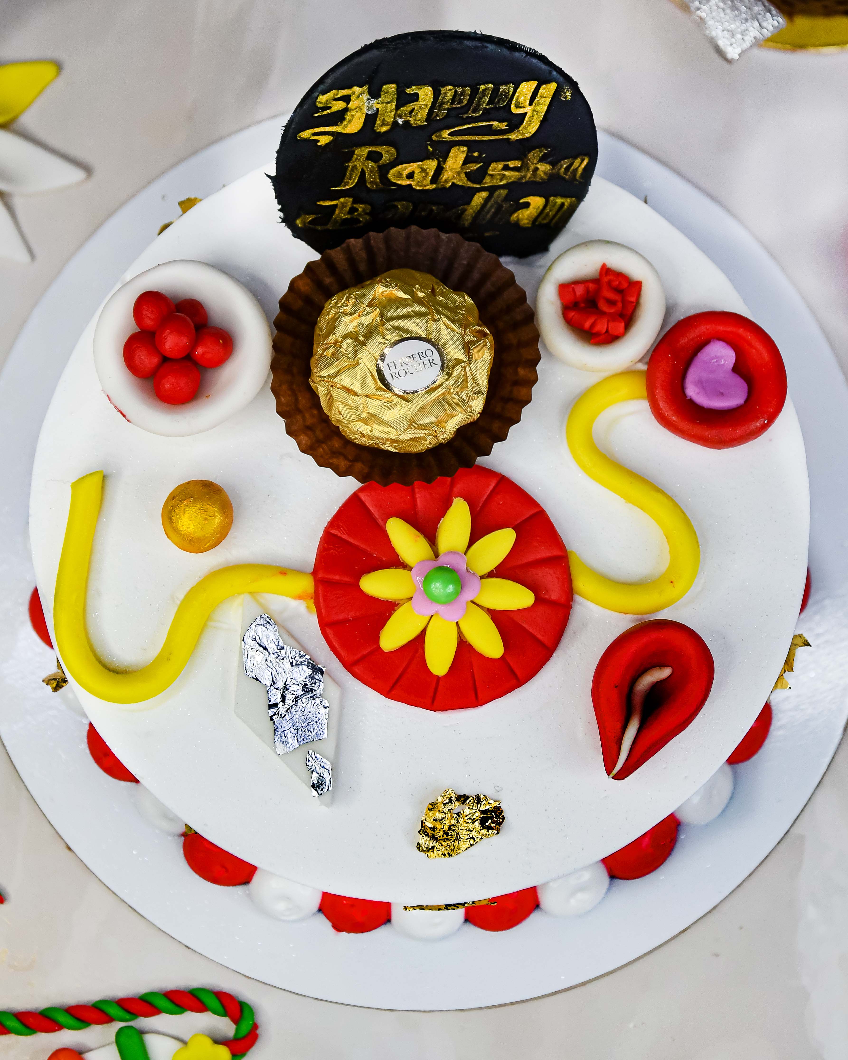 Order Rudraksh Beads Rakhi N Cake Combo Online, Price Rs.895 | FlowerAura
